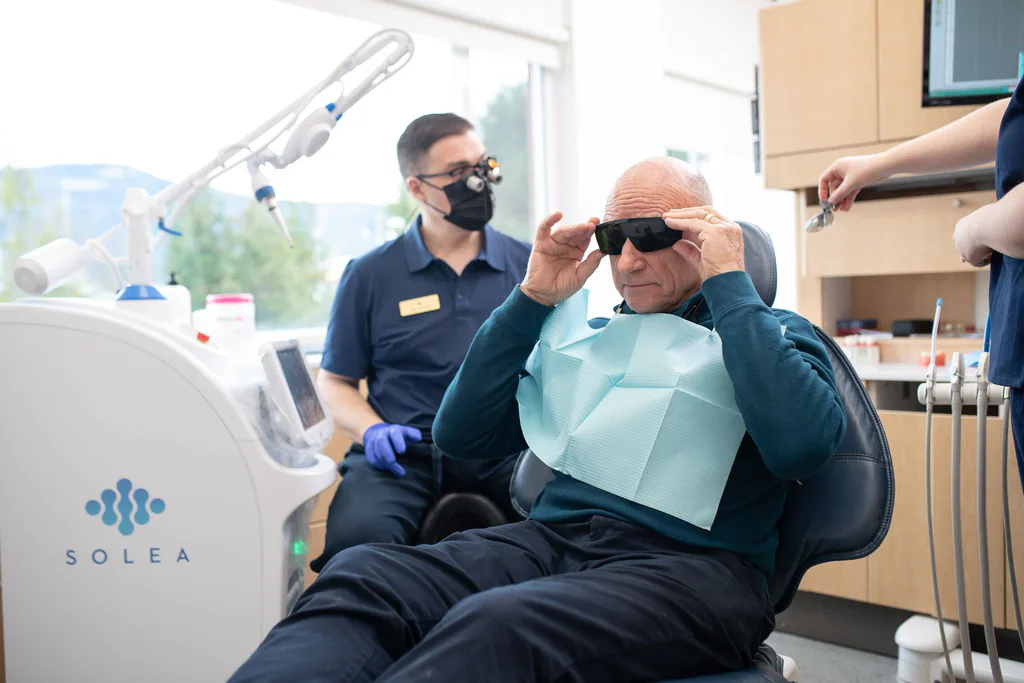 A patient wearing protective eyewear before Solea laser treatment